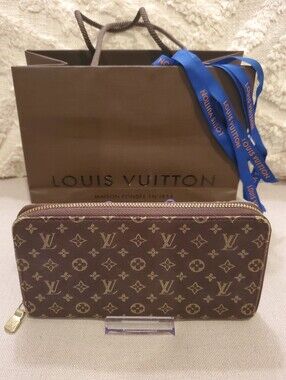 Louis Vuitton Mini Lin Monogram Zippy Wallet in Brown Canvas